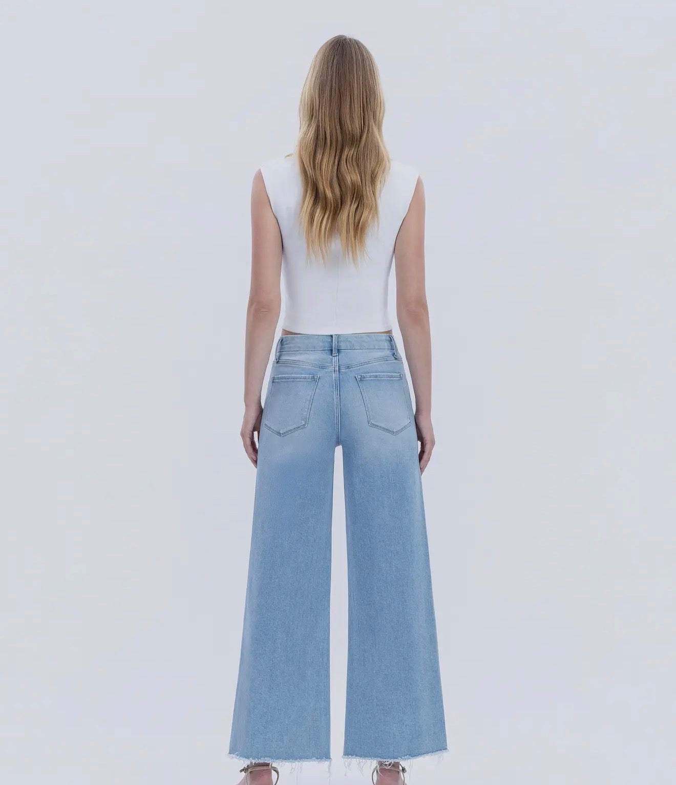 Flying Monkey-LIGHT WASH SEAMLESS WAISTBAND RAW HEM WIDE LEG JEANS