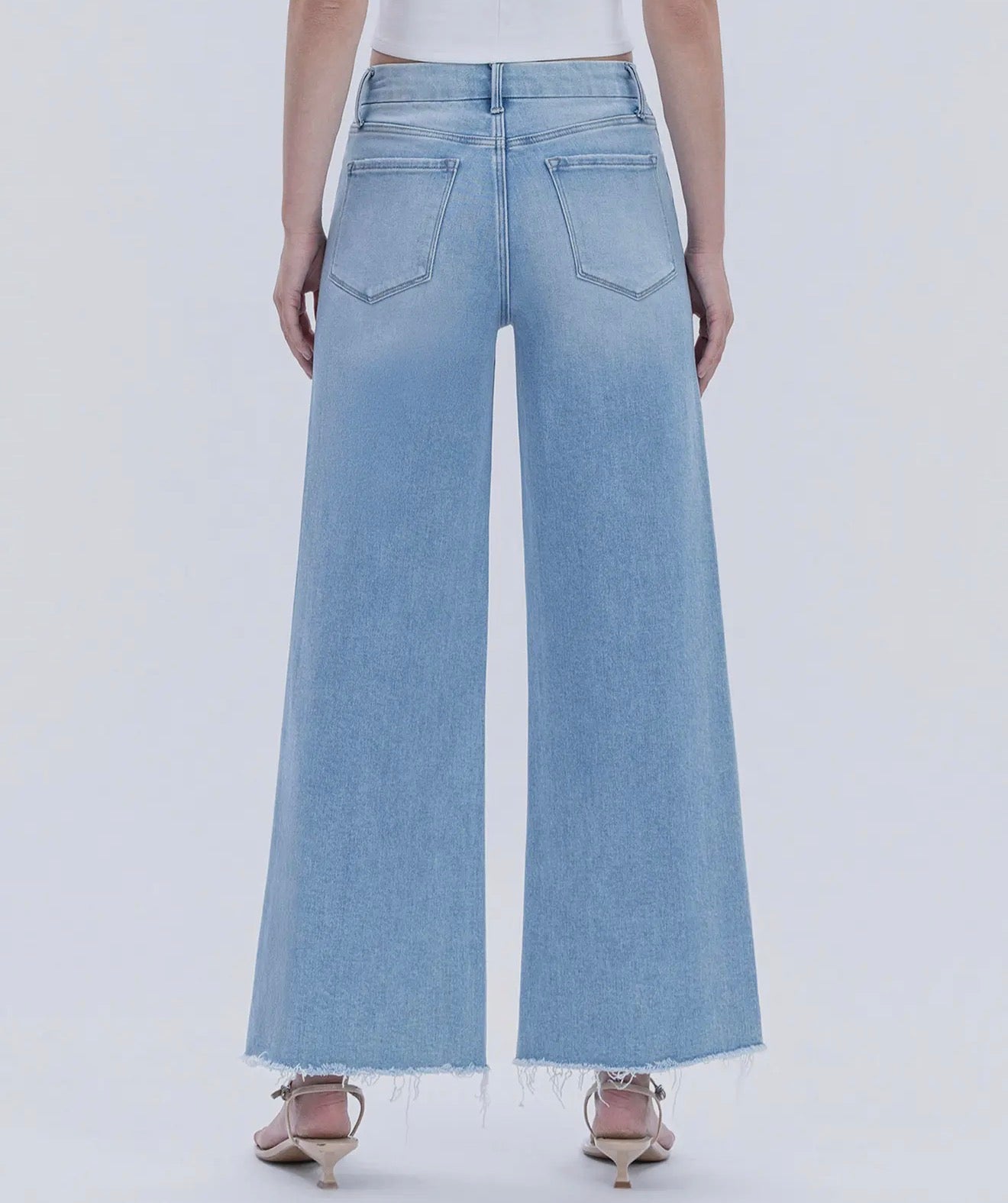 Flying Monkey-LIGHT WASH SEAMLESS WAISTBAND RAW HEM WIDE LEG JEANS